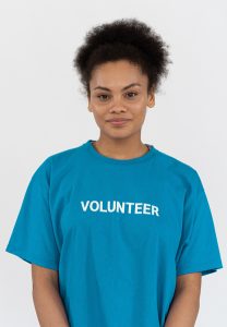 girl wearing a volunteer shirt